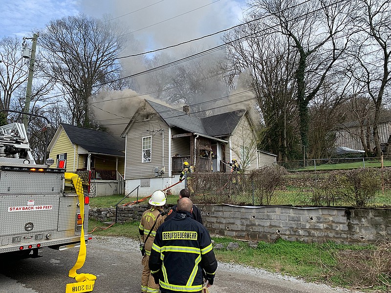 Firefighters extinguish a house fire Monday afternoon, Feb. 18, 2019, in the 3100 block of Noa Street in Chattanooga. / Photo by Bruce Garner/Chattanooga Fire Department
