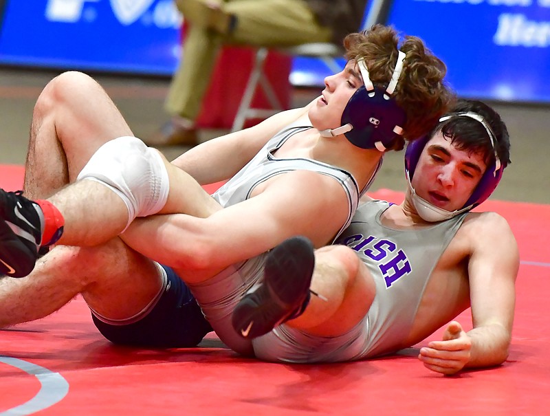 McCallie's James Whitworth (left) and Father Ryan's Lawrence Madson, appear calm and relaxed. They were just the opposite as they grappled during their DII, 152 pound TSSAA Championship won by Whitworth by fall at 2:42. (Photo by Phil Stauder/mainstreetpreps.com)