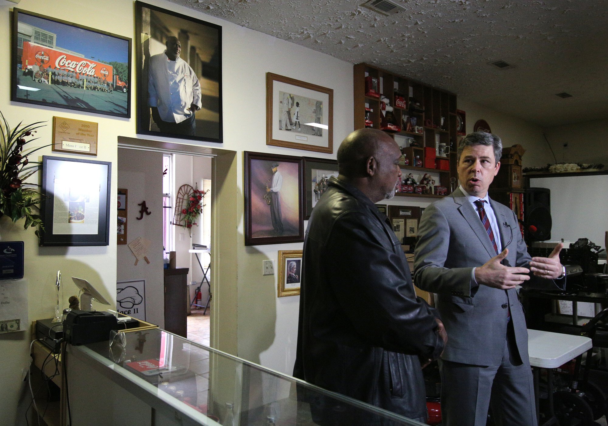 Chattanooga Mayor Andy Berke speaks with Darnell Moss, the owner of Moss' Place Catering, about the benefits of a proposed new loan initiative to help small businesses at Moss' Place Catering Monday, February 18, 2019 in Chattanooga, Tennessee. Berke said he expects more than 10 companies to take advantage of the effort that could provide individual businesses with loans of up to $25,000.