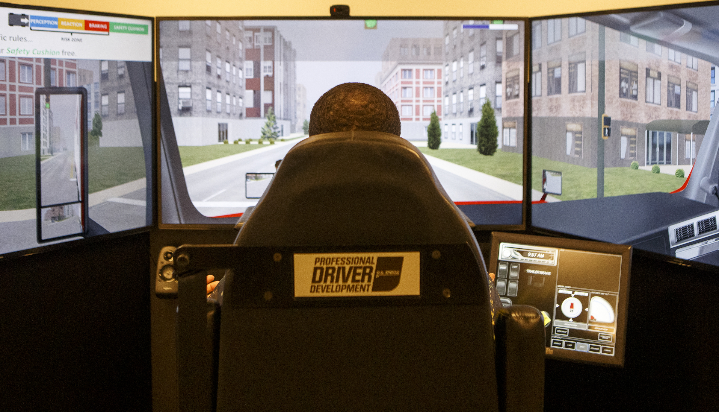 A potential U.S. Xpress employee drives on the simulator at the U.S. Xpress Tunnel Hill facility on Tuesday, Feb. 19, 2019 in Tunnel Hill, Ga. The simulator is part of the Professional Driver Development program at U.S. Xpress.
