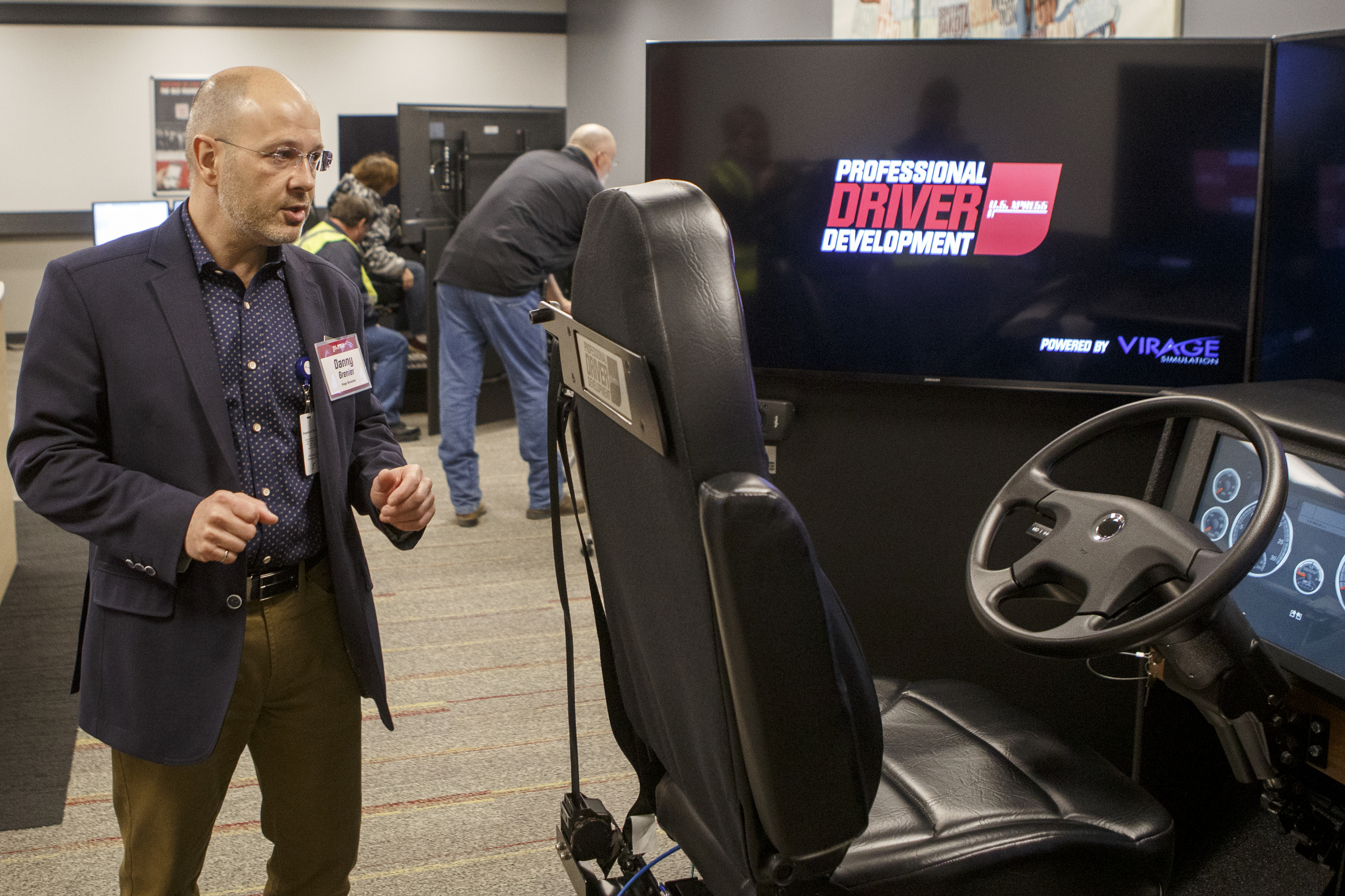 Virage Simulation President Danny Grenier talks about the driving simulator, part of the Professional Driver Development program, at the U.S. Xpress Tunnel Hill facility on Tuesday, Feb. 19, 2019 in Tunnel Hill, Ga.