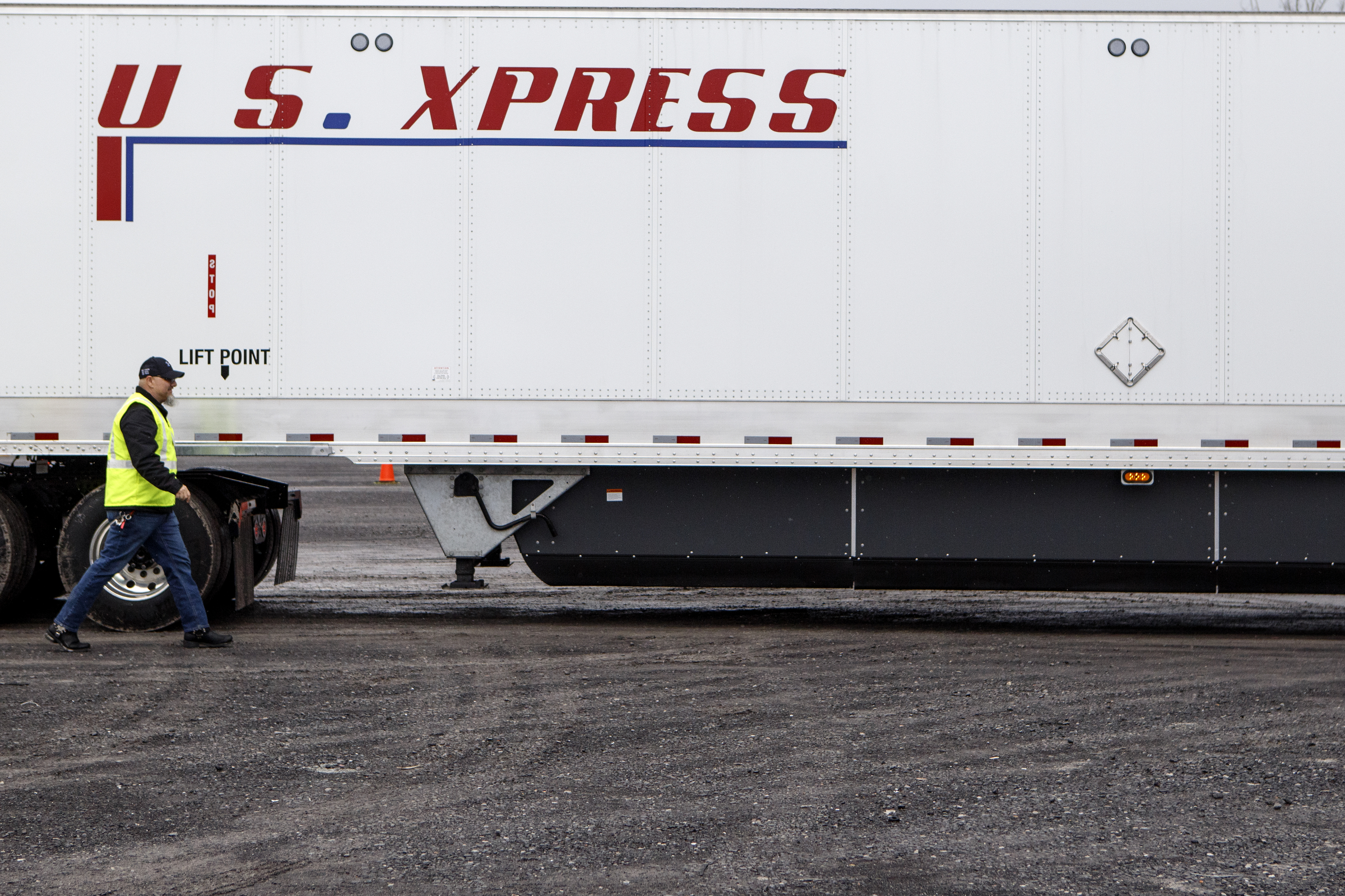 Trainer, Mentor and Road Team Captain Don Blair walks along his trailer while demoing the driving range at the U.S. Xpress Tunnel Hill facility on Tuesday, Feb. 19, 2019 in Tunnel Hill, Ga. The driving range is part of the Professional Driver Development program and offers potential drivers a course to practice different maneuvers.