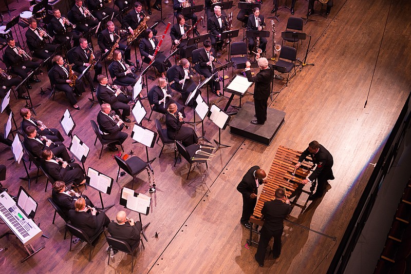 Senior Chief Musician Stacy B. Loggins, Chief Musician Randy A. Johnson and Musician 1st Class Jeffrey R. DeRoche perform the Stubernic Fantasy on the marimba with the U.S. Navy Band. (Photo by Chief Musician Brian P. Bowman)