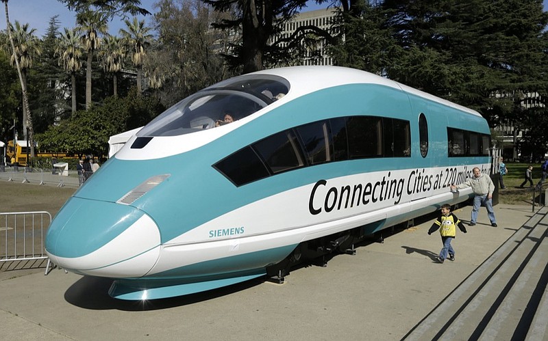 FILE - This Feb. 26, 2015, photo shows a full-scale mock-up of a high-speed train, displayed at the Capitol in Sacramento, Calif. (AP Photo/Rich Pedroncelli, File)

