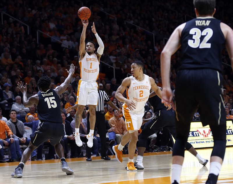 Tennessee guard Lamonte Turner (1) shoots over Vanderbilt forward Clevon Brown (15) during the first half of an NCAA college basketball game Tuesday, Feb. 19, 2019, in Knoxville, Tenn. (AP Photo/Wade Payne)

