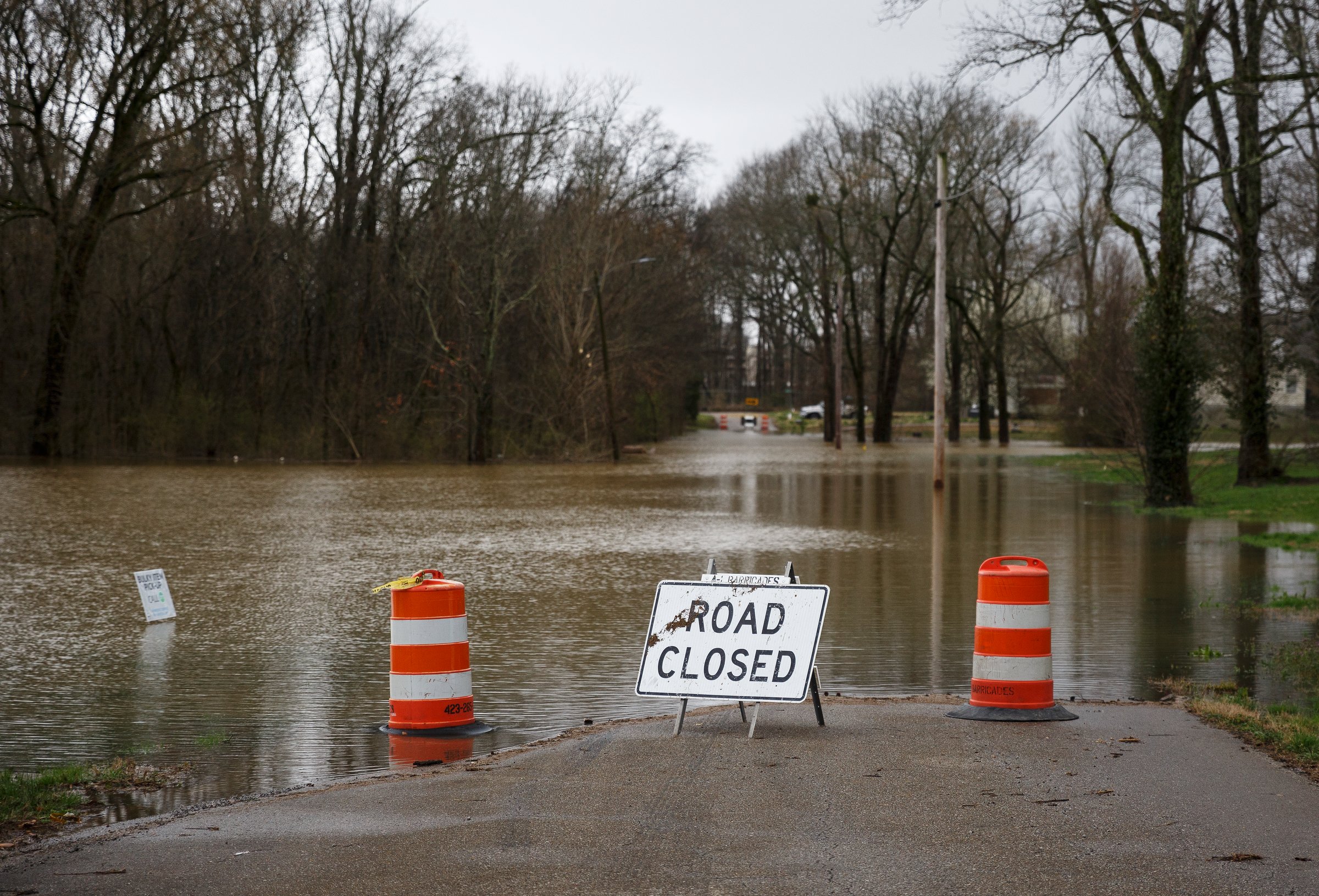 Floodwaters cover Aster Road in Lookout Valley after heavy rainfall on Wednesday, Feb. 20, 2019, in Chattanooga, Tenn. Continuous rain through the week has raised area waterways to flood stages, with more rain expected in the coming days.