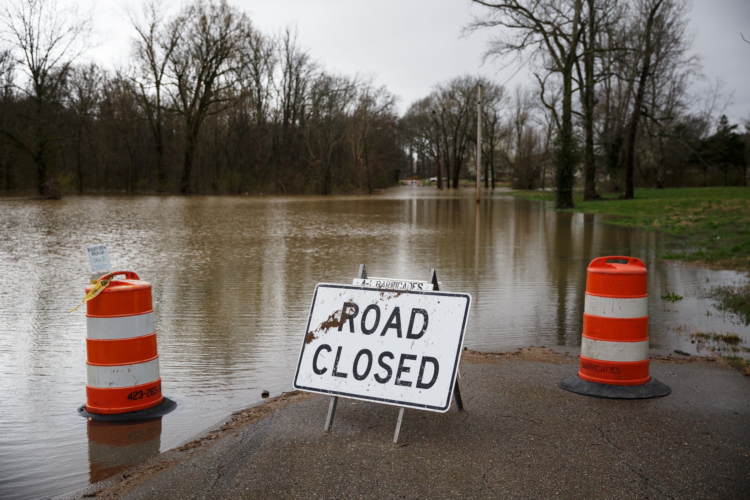 Floodwaters cover Aster Road in Lookout Valley after heavy rainfall on Wednesday, Feb. 20, 2019, in Chattanooga, Tenn. Continuous rain through the week has raised area waterways to flood stages, with more rain expected in the coming days.