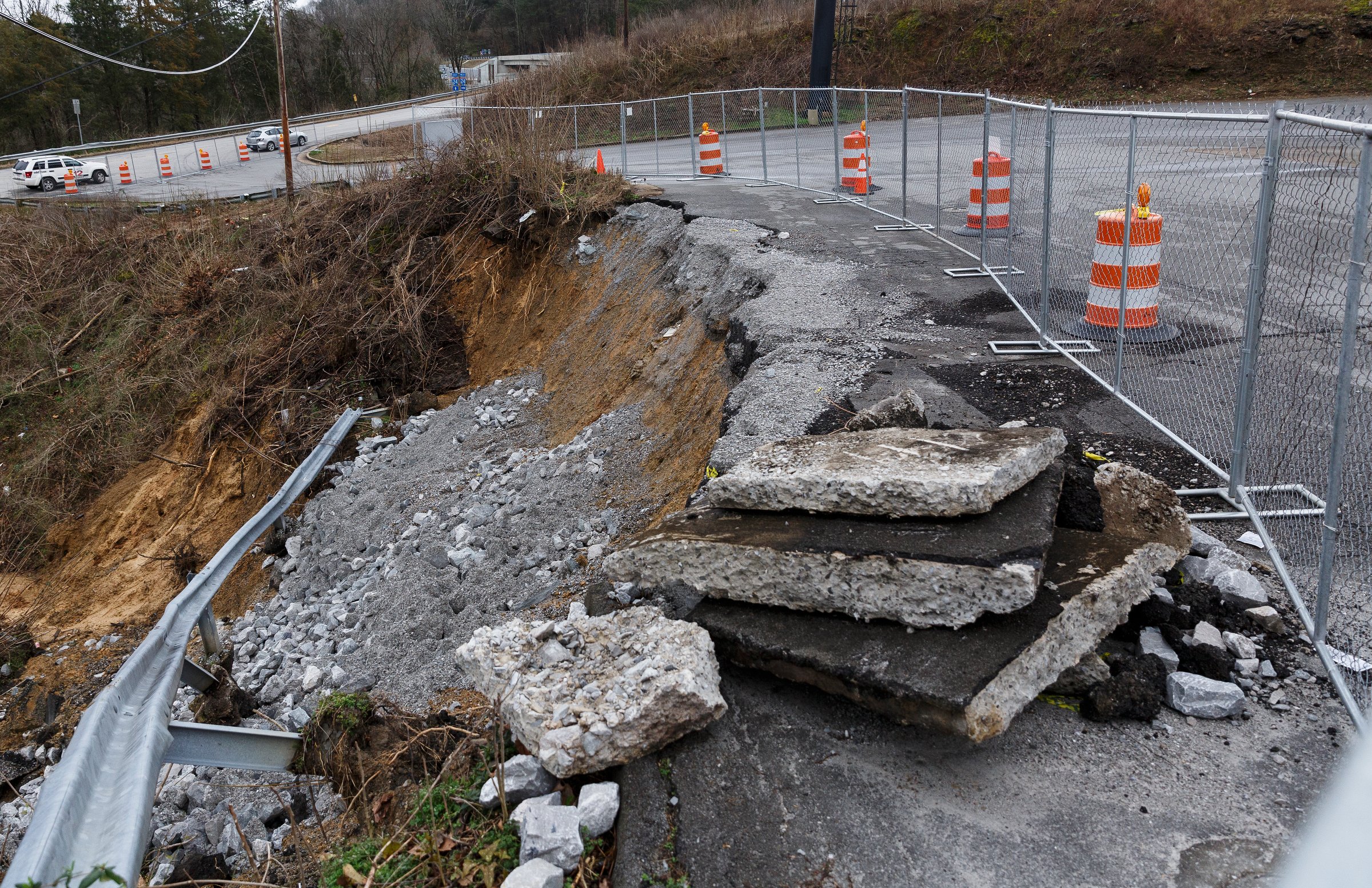 A section of hillside beneath a Mapco gas station slid away after heavy rainfall, seen on Wednesday, Feb. 20, 2019, in Wildwood, Ga. Continuous rain through the week has raised area waterways to flood stages, with more rain expected in the coming days.