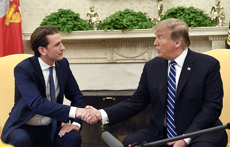 President Donald Trump shakes hands as he meets with Austrian Chancellor Sebastian Kurz in the Oval Office of the White House in Washington, Wednesday, Feb. 20, 2019. (AP Photo/Susan Walsh)