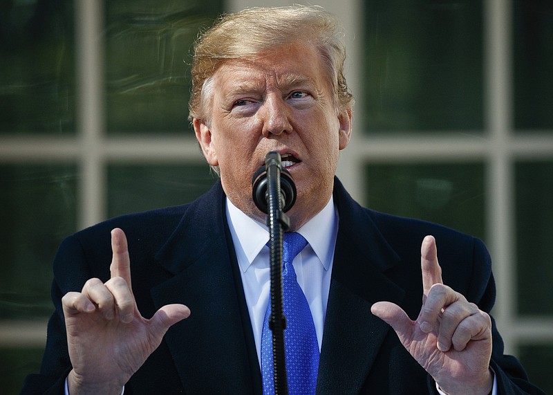FILE - In this Friday, Feb. 15, 2019, file photo, President Donald Trump declares a national emergency in order to build a wall along the southern border during an event in the Rose Garden at the White House in Washington. (AP Photo Evan Vucci, File)