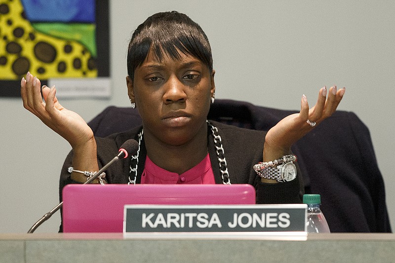 Hamilton County District 5 School Board member Karista Jones reacts after being interrupted during a discussion on transportation during a school board meeting on Thursday, Feb. 21, 2019 in Chattanooga, Tenn.
