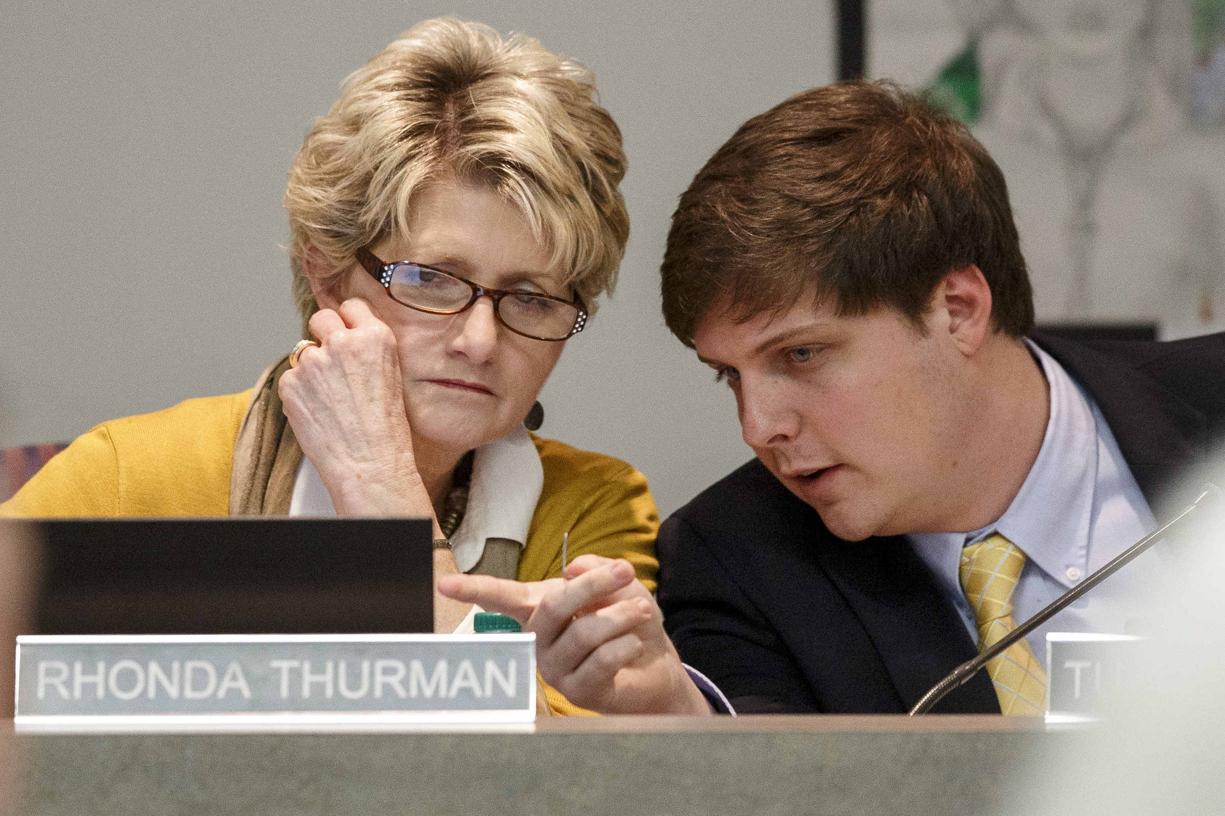 Hamilton County District 8 School Board member Tucker McClendon, right, talks with District 1 board member Rhonda Thurman during a conversation on transportation during a school board meeting on Thursday, Feb. 21, 2019 in Chattanooga, Tenn.