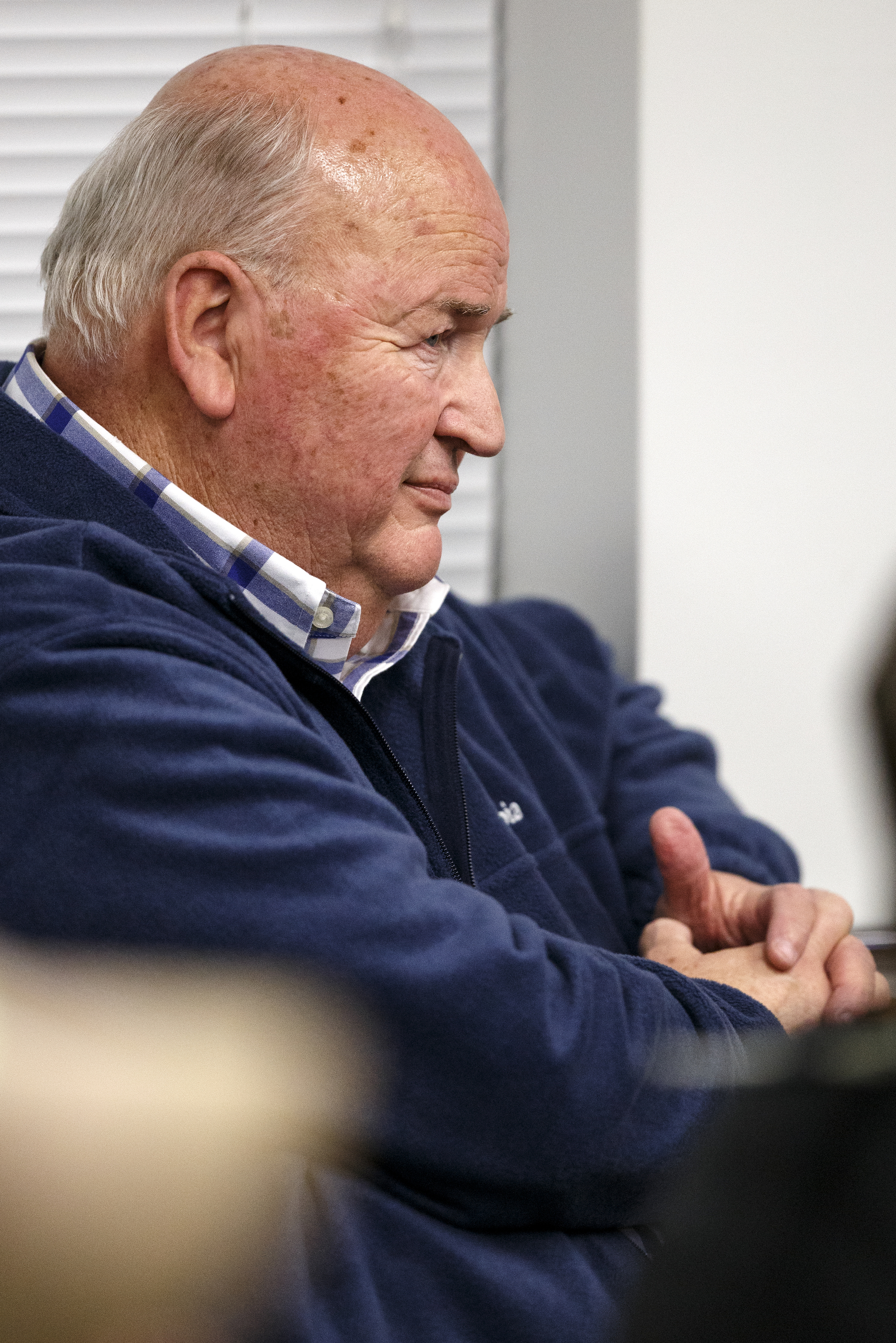 Bus driver John Shackleboard looks on during a conversation about transportation during a school board meeting on Thursday, Feb. 21, 2019 in Chattanooga, Tenn.