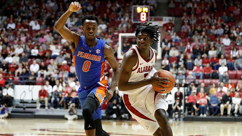 Alabama freshman guard Kira Lewis Jr., with ball, had his fifth consecutive double-digit scoring game in last Saturday's loss to Florida, but he was held to five points Tuesday night in an embarrassing setback at Texas A&M.
