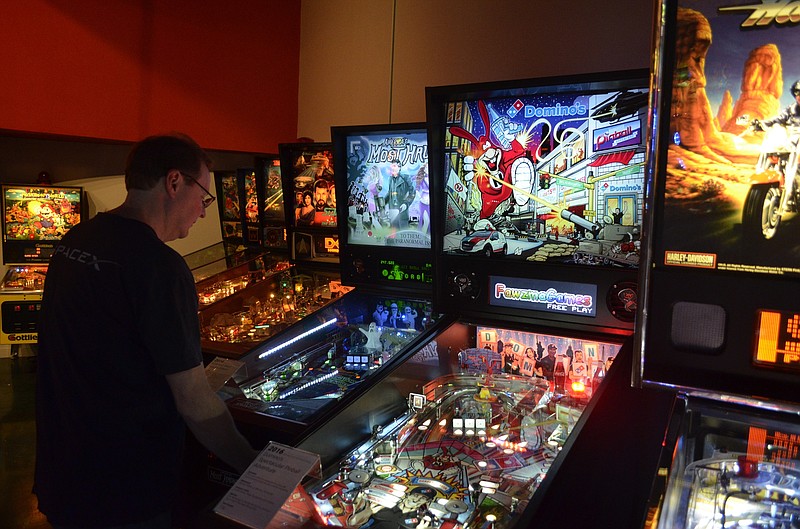 Classic Arcade Pinball Museum co-owner Dave Alverson plays "America's Most Haunted," his favorite machine — and one of the hardest — in the museum.