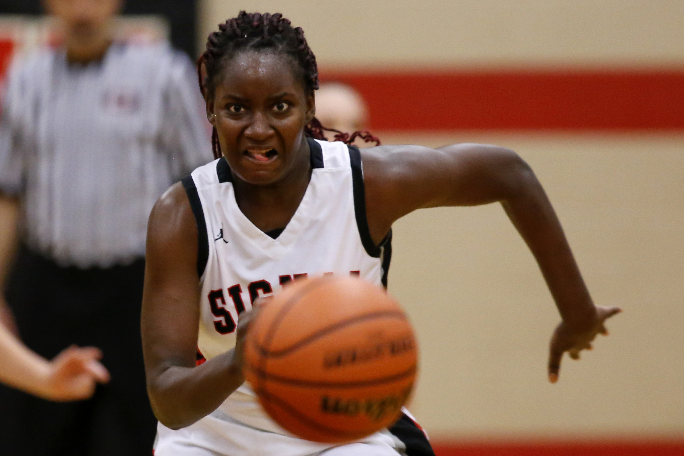 Signal Mountain's Lamiah Walker (23) chases down a loose ball during the Region 3-AA quarterfinals against Sequoyah at Signal Mountain Middle/High School on Friday, Feb. 22, 2019 in Signal Mountain, Tenn.