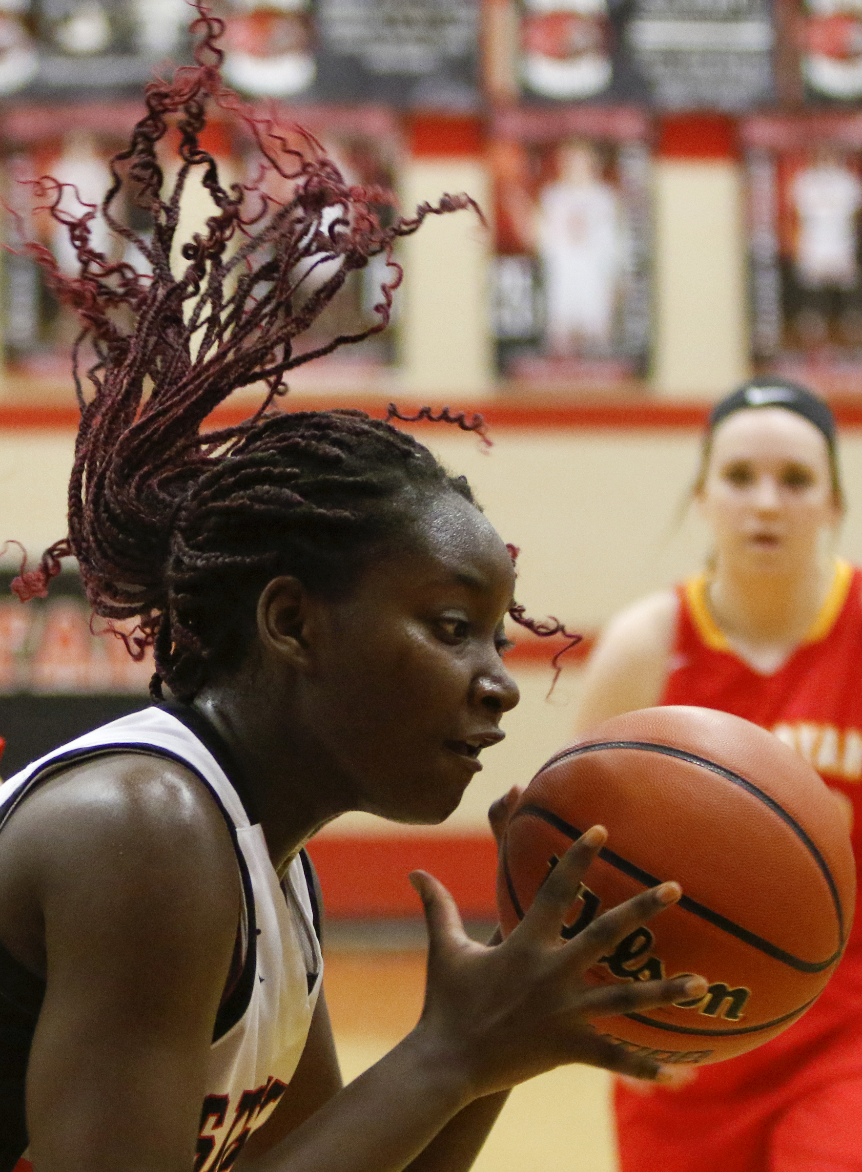 Signal Mountain's Lamiah Walker's hair flies as she comes down with the ball against Sequoyah during the Region 3-AA quarterfinals at Signal Mountain Middle/High School on Friday, Feb. 22, 2019 in Signal Mountain, Tenn.