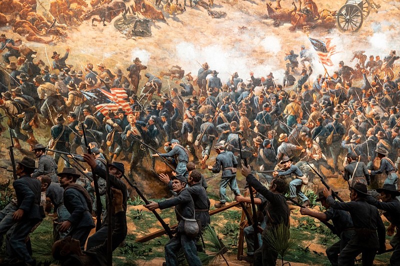 In this Friday, Feb 15, 2019 photo, The Atlanta Cyclorama, an enormous painting more than 100 years old, is seen at the Atlanta History Center on Friday, Feb 15, 2019, in Atlanta. The Atlanta Cyclorama depicts charging horses, wounded soldiers, cannon blasts and smoke as Union troops defeated Confederate forces and then torched much of the city. (Atlanta History Center via AP)

