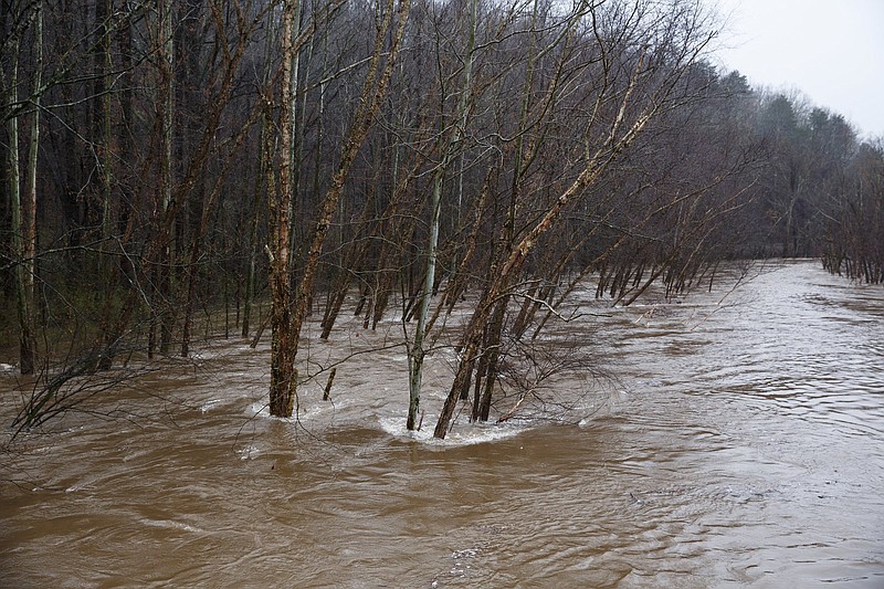 North Chickamauga Creek overflows its banks on Saturday, Feb. 23, 2019, in Soddy-Daisy, Tenn. A week of rainfall led to widespread flooding across the Tennessee Valley. 