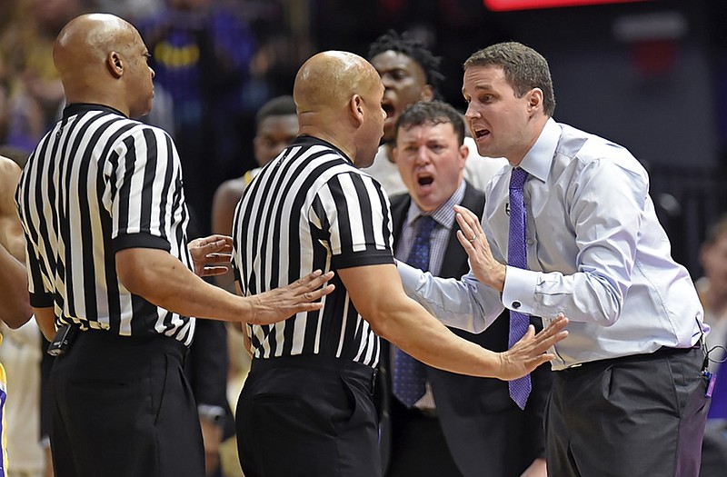 LSU men's basketball coach Will Wade expresses his displeasure with an official's call during the first half of the Tigers' win against Tennessee last month in Baton Rouge, La.