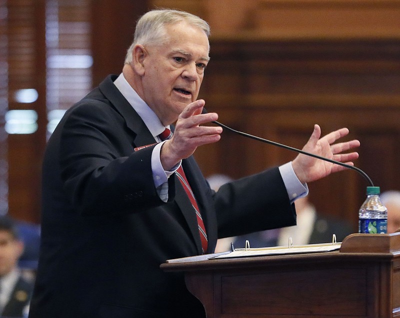 House Speaker David Ralston takes to the well during Morning Orders Monday, February 25, 2019 to address accusations that he has abused his authority. Several Republican lawmakers signed onto a resolution calling for Ralston to resign over his use of power to delay court proceedings for his clients as a criminal defense lawyer.  (Bob Andres/Atlanta Journal-Constitution via AP)