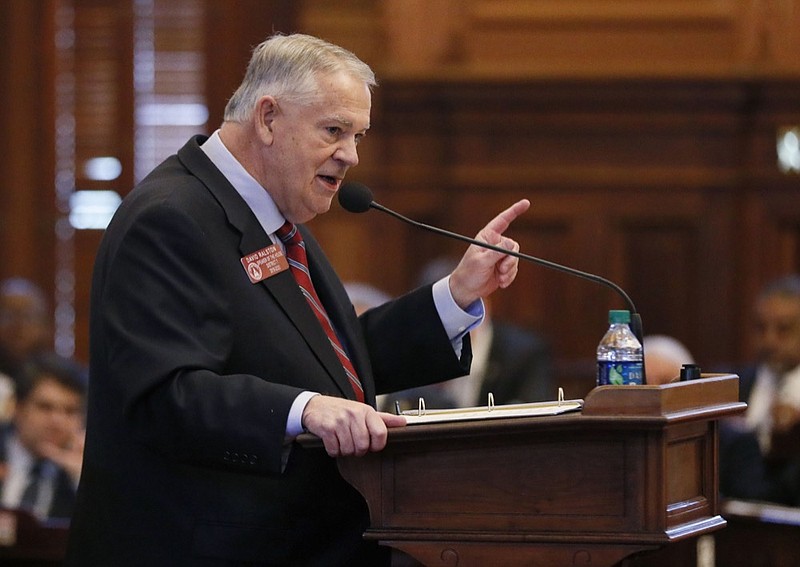 House Speaker David Ralston takes to the well during Morning Orders Monday, February 25, 2019 to address accusations that he has abused his authority. Several Republican lawmakers signed onto a resolution calling for Ralston to resign over his use of power to delay court proceedings for his clients as a criminal defense lawyer. (Bob Andres/Atlanta Journal-Constitution via AP)

