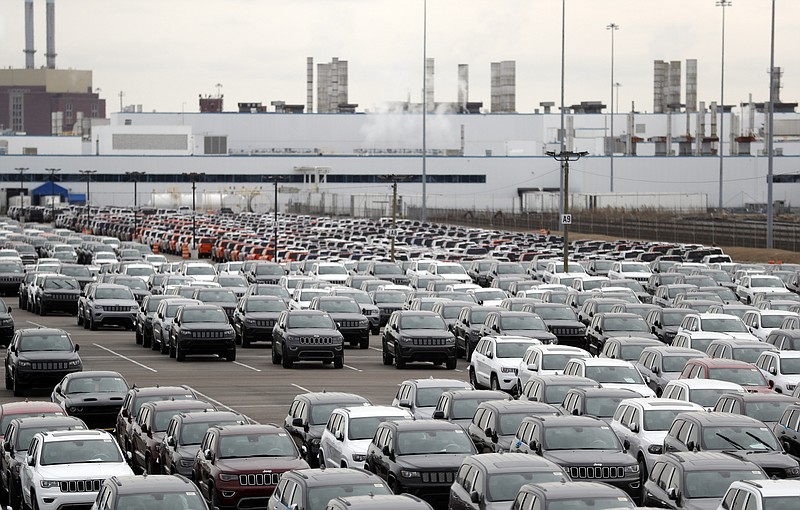 Jeep vehicles are parked outside the Jefferson North Assembly Plant in Detroit, Tuesday, Feb. 26, 2019. Fiat Chrysler announced plans on Tuesday for a new Jeep factory, the city's first new auto plant in a generation, as part of a $4.5 billion manufacturing expansion in southeast Michigan. FCA said it would convert the Mack Avenue Engine factory to an assembly plant for the next-generation Jeep Grand Cherokee and make an investment at Jefferson North Assembly Plant to retool and modernize the factory for continued production of the Dodge Durango. (AP Photo/Carlos Osorio)