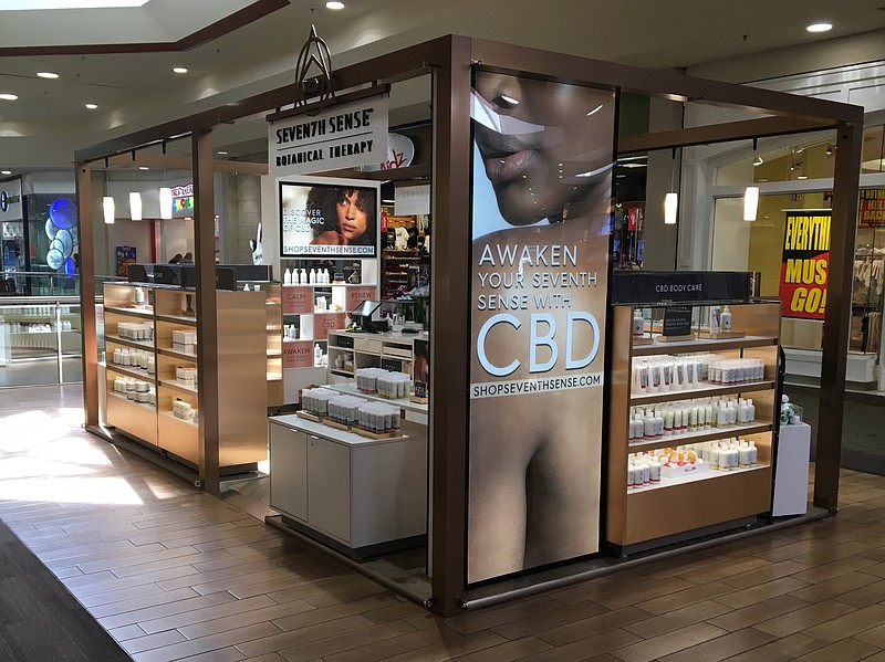 Seventh Sense CBD shop at Hamilton Place Mall is one of three shopping mall kiosks that Green Growth Brands opened in malls in the past month / Staff photo by Dave Flessner