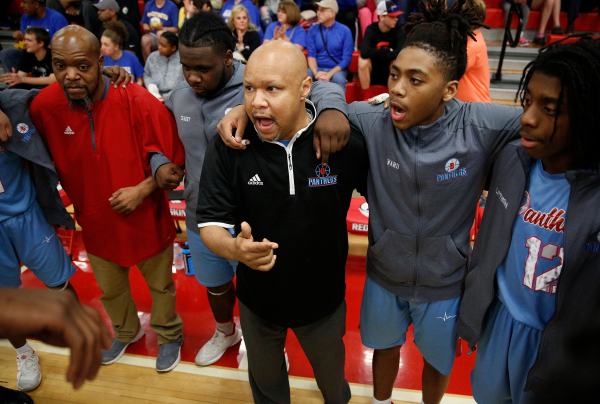 Brainerd coach Levar Brown talks with players before the Panthers' Region 3-AA basketball tournament semifinal game against Sweetwater at Loudon High School on Tuesday, Feb. 26, 2019, in Loudon, Tenn.