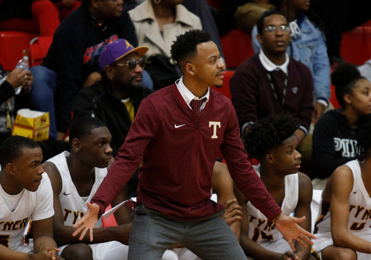 Tyner coach E'Jay Ward shouts to players during their Region 3-AA basketball tournament semifinal game against Howard at Loudon High School on Tuesday, Feb. 26, 2019, in Loudon, Tenn. Brainerd won 70-65.