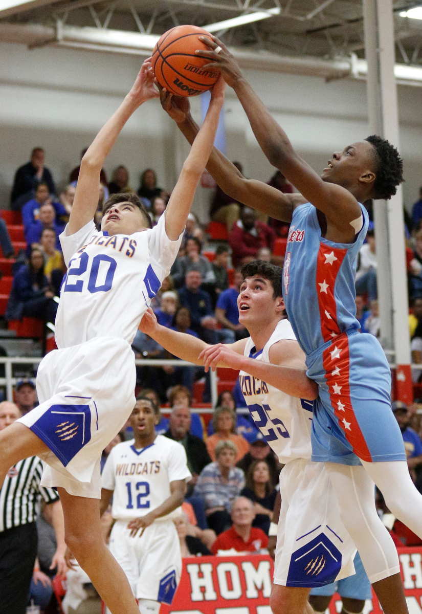 Brainerd's LaDerron Freeman, right, rebounds against Sweetwater's Jayce Upton during the Panthers' Region 3-AA basketball tournament semifinal game against Sweetwater at Loudon High School on Tuesday, Feb. 26, 2019, in Loudon, Tenn.