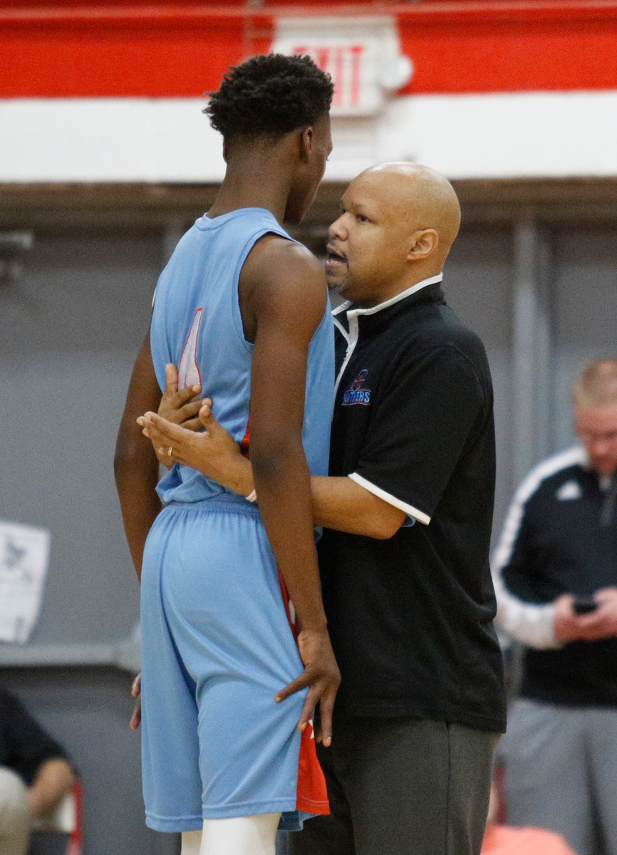 Brainerd basketball coach Levar Brown counsels player LaDerron Freeman in a timeout during the Panthers' Region 3-AA basketball tournament semifinal game against Sweetwater at Loudon High School on Tuesday, Feb. 26, 2019, in Loudon, Tenn.