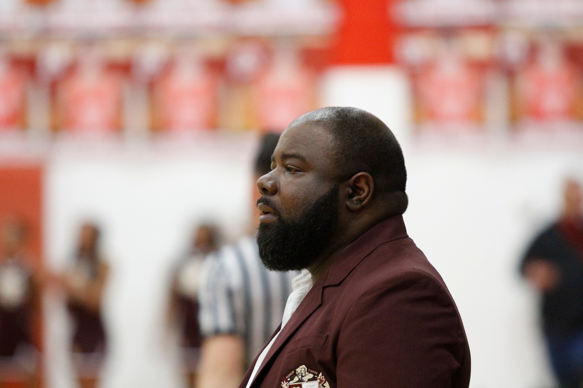 Howard coach James Talley watches from the bench during their Region 3-AA basketball tournament semifinal game against Tyner at Loudon High School on Tuesday, Feb. 26, 2019, in Loudon, Tenn. Brainerd won 70-65.