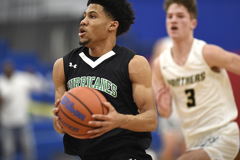 East Hamilton's Cameron Montgomery (2) drives to the basket on the fast break.  The East Hamilton Hurricanes met the Stone Memorial Panthers in the boys' TSSAA, Region 3-AAA semifinal game on February 26, 2019, played at Cleveland High School.  