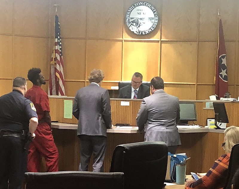 D'Marcus White appears in court Tuesday, Feb. 26, 2019, with his public defender, Jay Perry. On the right is prosecutor Cameron Williams. 