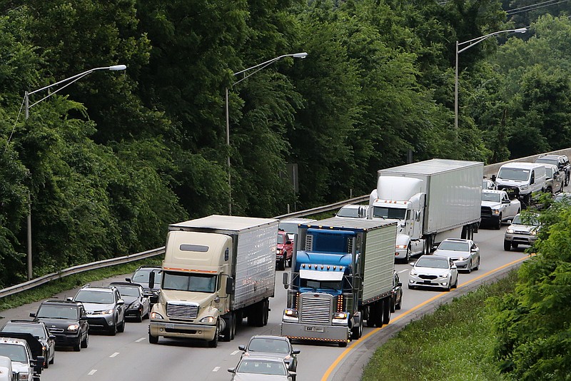 Stop and go traffic makes its way down Interstate 24 West near the Old Ringgold Road overpass Thursday, June 28, 2018 in Chattanooga, Tennessee. Traffic is expected to be heavy around the Fourth of July.