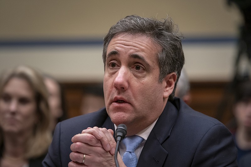 Michael Cohen, President Donald Trump's former personal lawyer, becomes emotional as he finishes a day of testimony to the House Oversight and Reform Committee, on Capitol Hill in Washington on Wednesday. (AP Photo/J. Scott Applewhite)