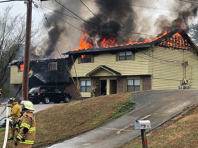 Highway 58 Volunteer Fire Department firefighters work to extinguish a residential fire Friday morning, March 1, 2019, on the 8700 block of Millard Lee Lane near Harrison. (Photo from Amy Maxwell / Hamilton County Office of Emergency Management)