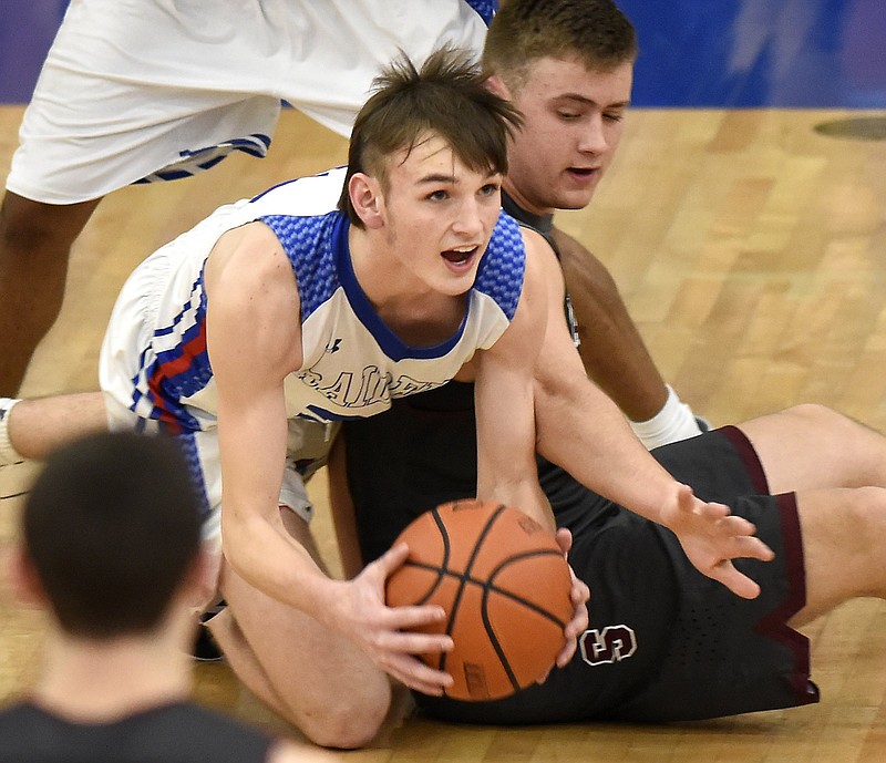 Cleveland's Kley McGowan looks for an open teammate after coming up with a loose ball during a Region 3-AAA semifinal against White County last month.  
