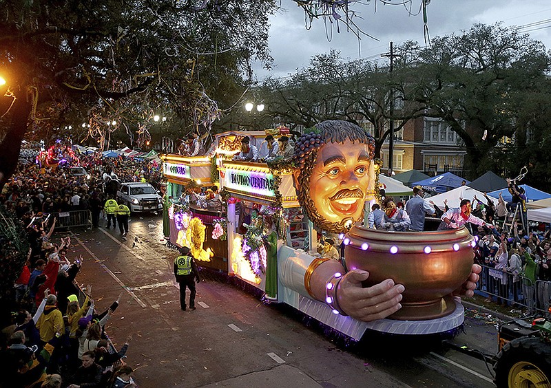 The Officer's Float rolls down Napoleon Avenue as the 1,600 men of Bacchus present their 32-float Mardi Gras parade entitled "Starring Louisiana" on the Uptown route in New Orleans on Sunday, March 3, 2019. (Michael DeMocker/The Times-Picayune via AP)

