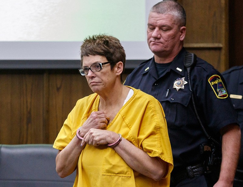 Janet Hinds is led into a courtroom for a preliminary hearing before Judge Alex McVeagh at the Hamilton County-Chattanooga Courts Building on Tuesday, March 5, 2019, in Chattanooga, Tenn. Judge McVeagh bound charges against Hinds in the Feb. 23 hit-and-run death of Chattanooga Police Officer Nicholas Galinger over to a grand jury.