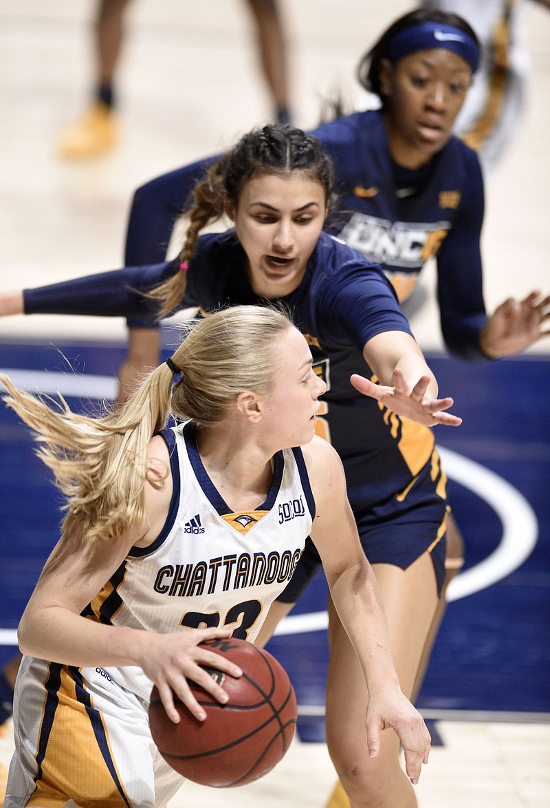 UTC junior Lakelyn Bouldin heads downcourt after grabbing a rebound during the Mocs' 64-54 win against UNC Greensboro on Feb. 2 at McKenzie Arena. The Mocs lost 53-49 at UNCG last week, and now the teams will meet in the first round of the SoCon tournament for the second straight year.