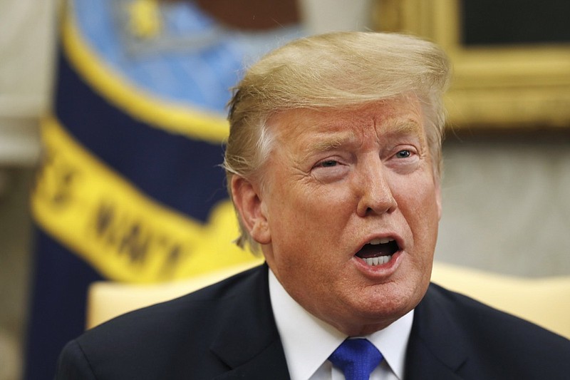 President Donald Trump speaks during a meeting with former U.S. hostage in Yemen, Danny Burch, Wednesday, March 6, 2019, in the Oval Office of the White House in Washington. (AP Photo/Jacquelyn Martin)