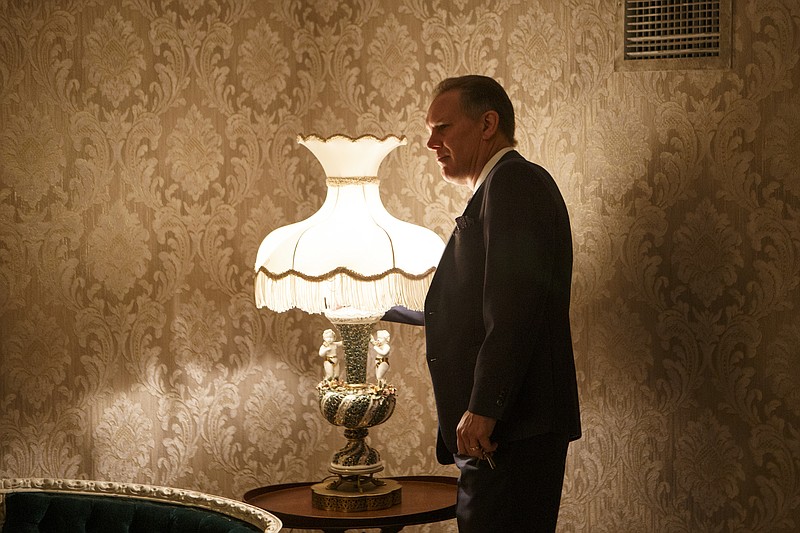 Ken Merkel, general manager of the Read House, turns on a light in Room 311 at the Read House. The room is supposedly haunted by the ghost of Annalisa Netherly, who was murdered in the room's bathtub in the 1920s.