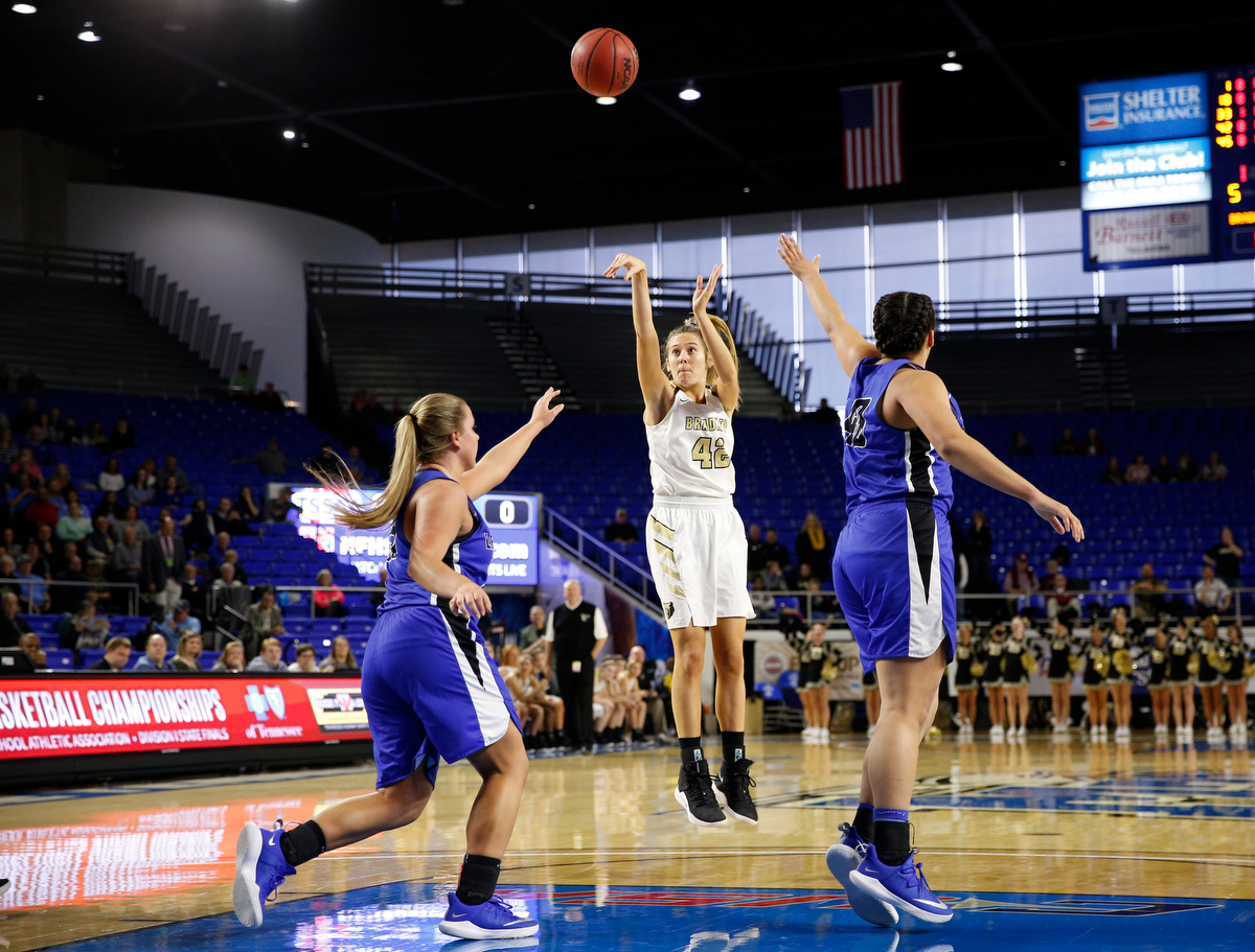 Bradley Central power forward Anna Walker (42) shoots between Lebanon center Christaney Brookshire (40) and wing Alissa Mulaski (25) during the Bearettes' TSSAA Class AAA girls basketball quarterfinal against the Lady Blue Devils at Middle Tennessee State University's Murphy Center on Thursday, March 7, 2019, in Murfreesboro, Tenn.