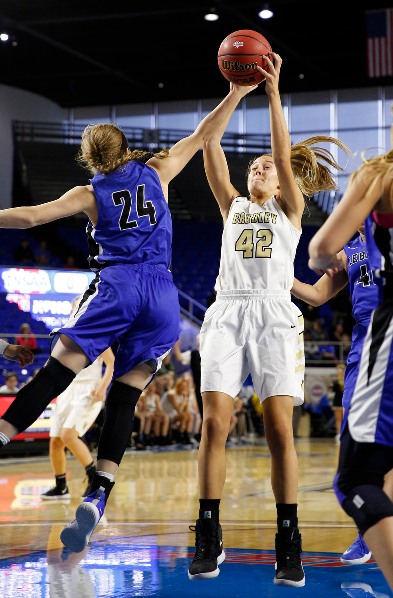 Bradley Central power forward Anna Walker (42) shoots over Lebanon shooting guard Aaryn Lester (24) during the Bearettes' TSSAA Class AAA girls basketball quarterfinal against the Lady Blue Devils at Middle Tennessee State University's Murphy Center on Thursday, March 7, 2019, in Murfreesboro, Tenn.