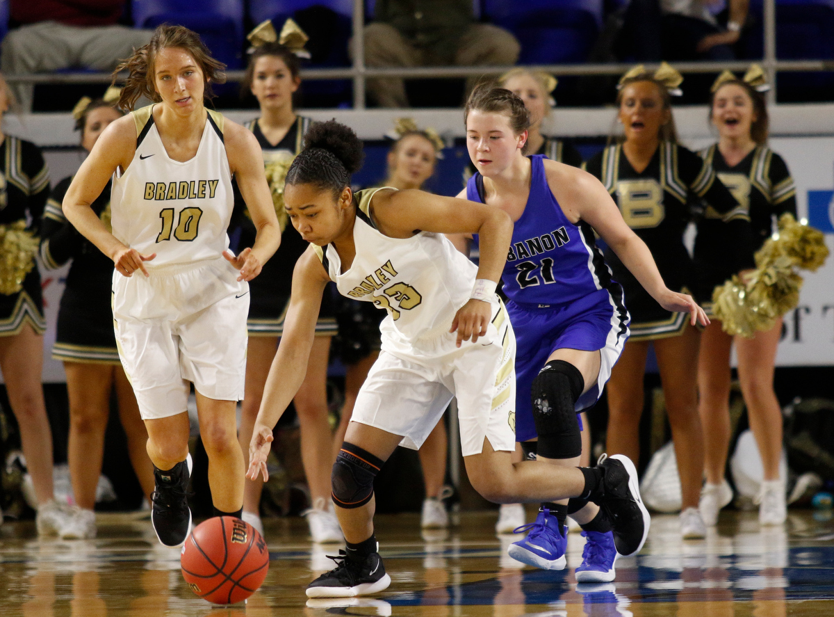 Bradley Central point guard Jamaryn Blair (33) secures a loose ball ahead of Lebanon point guard Addie Porter (21) during the Bearettes' TSSAA Class AAA girls basketball quarterfinal against the Lady Blue Devils at Middle Tennessee State University's Murphy Center on Thursday, March 7, 2019, in Murfreesboro, Tenn.