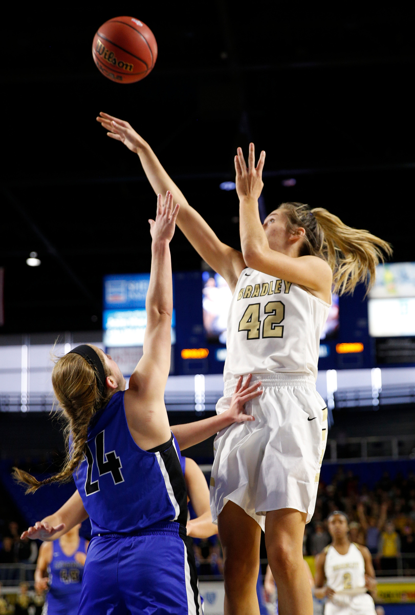 Bradley Central power forward Anna Walker (42) shoots over Lebanon shooting guard Aaryn Lester (24) during the Bearettes' TSSAA Class AAA girls basketball quarterfinal against the Lady Blue Devils at Middle Tennessee State University's Murphy Center on Thursday, March 7, 2019, in Murfreesboro, Tenn.