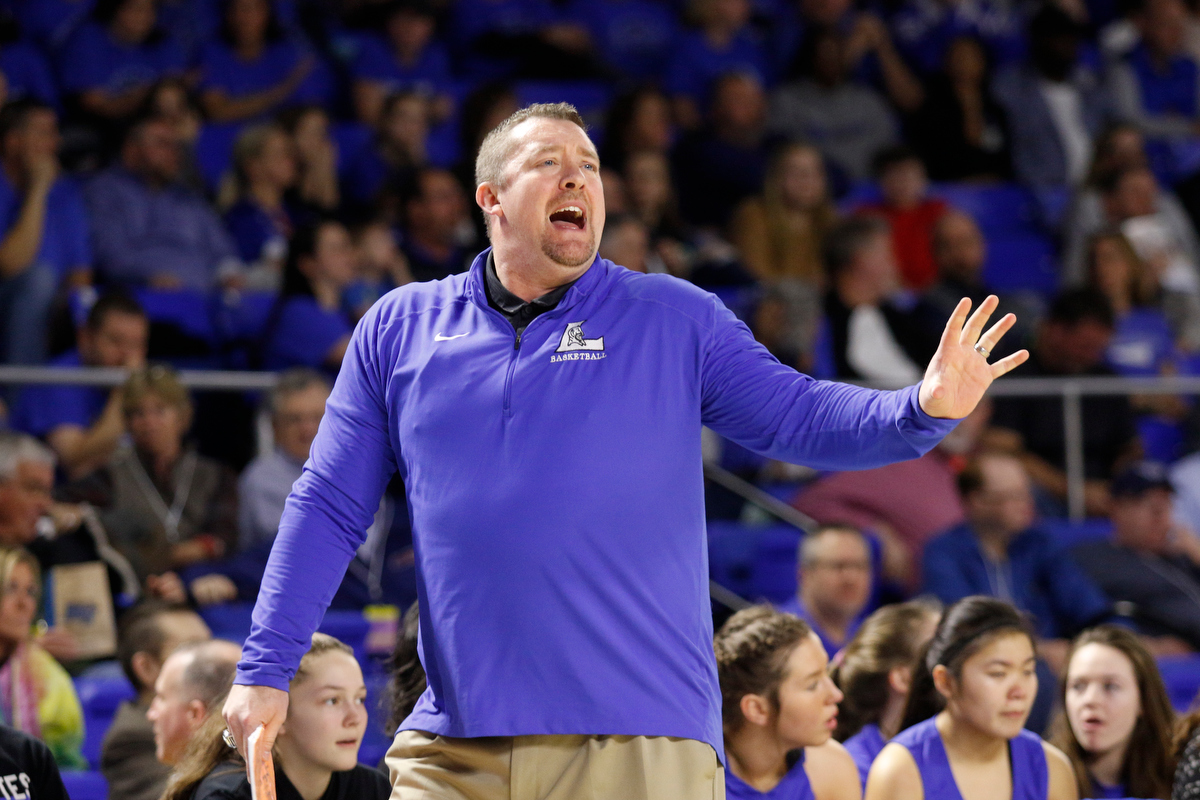 Lebanon girls basketball coach Cory Barrett shouts to players during the Bradley Central Bearettes' TSSAA Class AAA girls basketball quarterfinal against the Lady Blue Devils at Middle Tennessee State University's Murphy Center on Thursday, March 7, 2019, in Murfreesboro, Tenn.