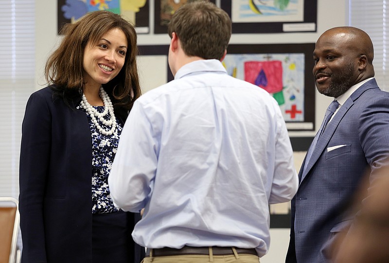 Tennessee Education Commissioner Penny Schwinn is introduced to Hamilton County School Board member Tucker McClendon by Hamilton County Schools Superintendent Bryan Johnson before the Partnership Network Advisory Board meeting in the Hamilton County Schools Board Room Thursday, March 7, 2019 in Chattanooga, Tennessee. Thursday was Schwinn's first visit to Hamilton County.